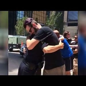 Crowds line up to hug police officers in Dallas after 12 officers were shot, killing 5 - YouTube