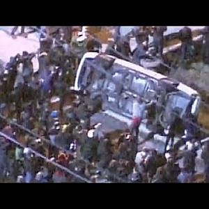 Ferguson protesters flip police car outside city hall - YouTube