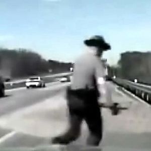 Dashcam captures the moment when police officer saves the life of a trucker. - YouTube