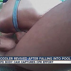 Heroic rescue of a drowned toddler captured on a patrolman's new body cam - YouTube